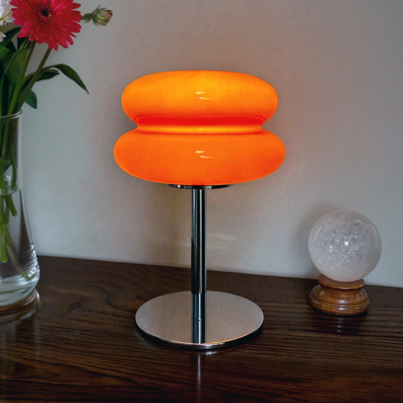 lampe de table verre vintage orange allumée boule