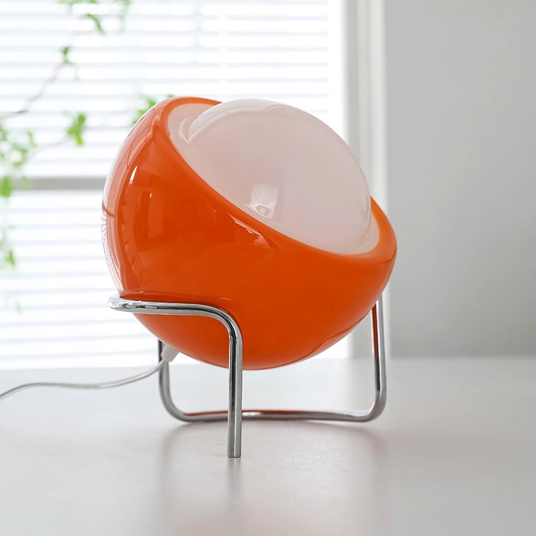 lampe en verre orange boule oeuf fenêtre plante