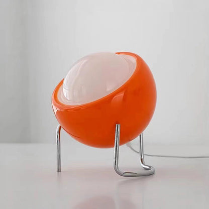 lampe en verre orange boule oeuf table blanche