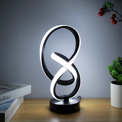 lampes à poser noire bureau livres plante
